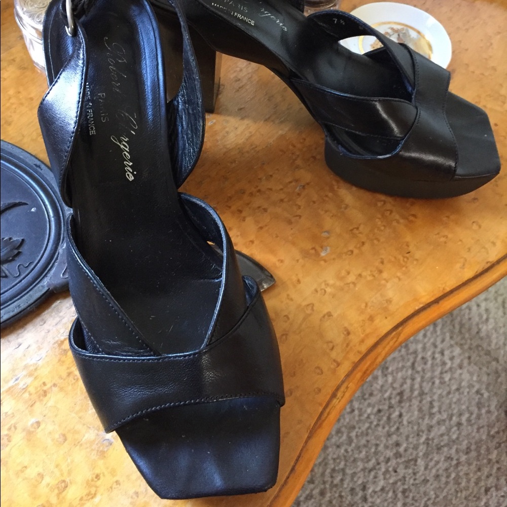 Clergerie black leather sandals with heel.